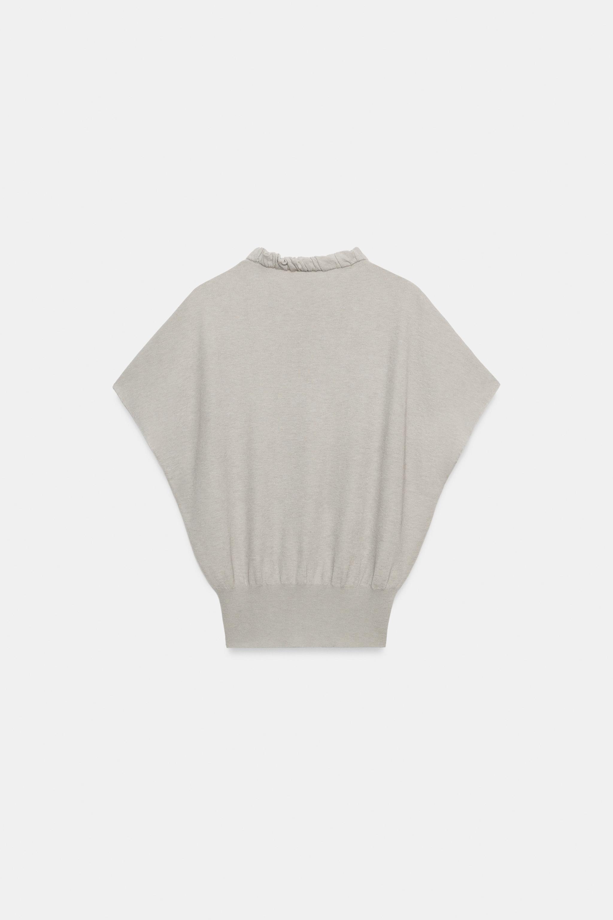 TOP EN MAILLE À COL PLISSÉ